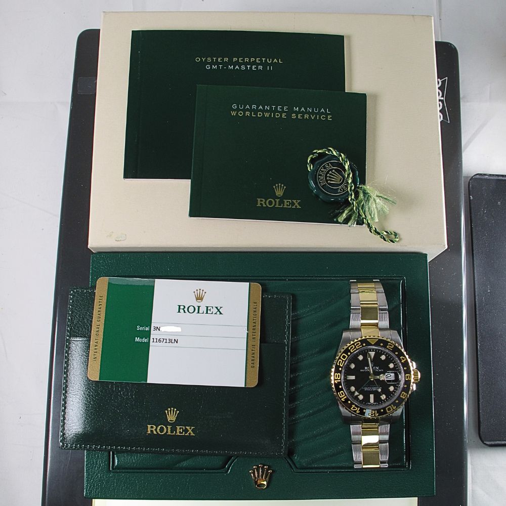 Pre-Owned Rolex 40MM GMT Master II (2016) Two Tone Model 116713 b and p outside