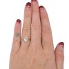 0.70ct Oval Diamond Bezel Set Engagement Ring in 14K White & Yellow Gold modeled