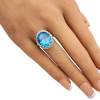 Diamond Halo Blue Topaz Ring on Hand