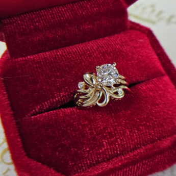 custom gold octopus ring holding a diamond