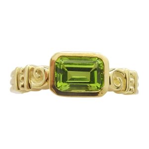 14K Yellow Gold Emerald-Cut Peridot Ring With Gold Design and Swirls Front View