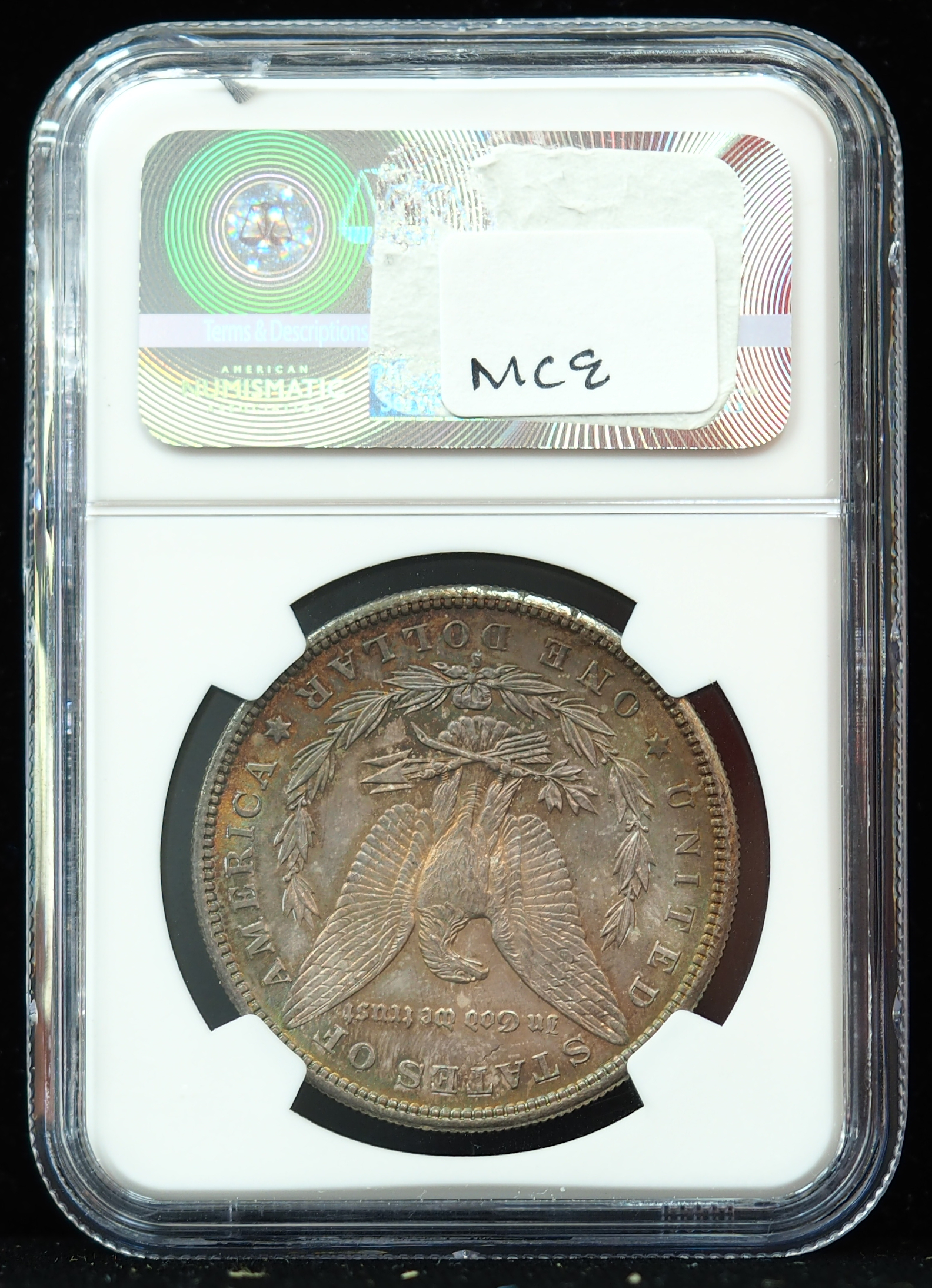 Buy 1881-S Morgan Dollar MS64 NGC – Rainbow Toned Online | Arnold
